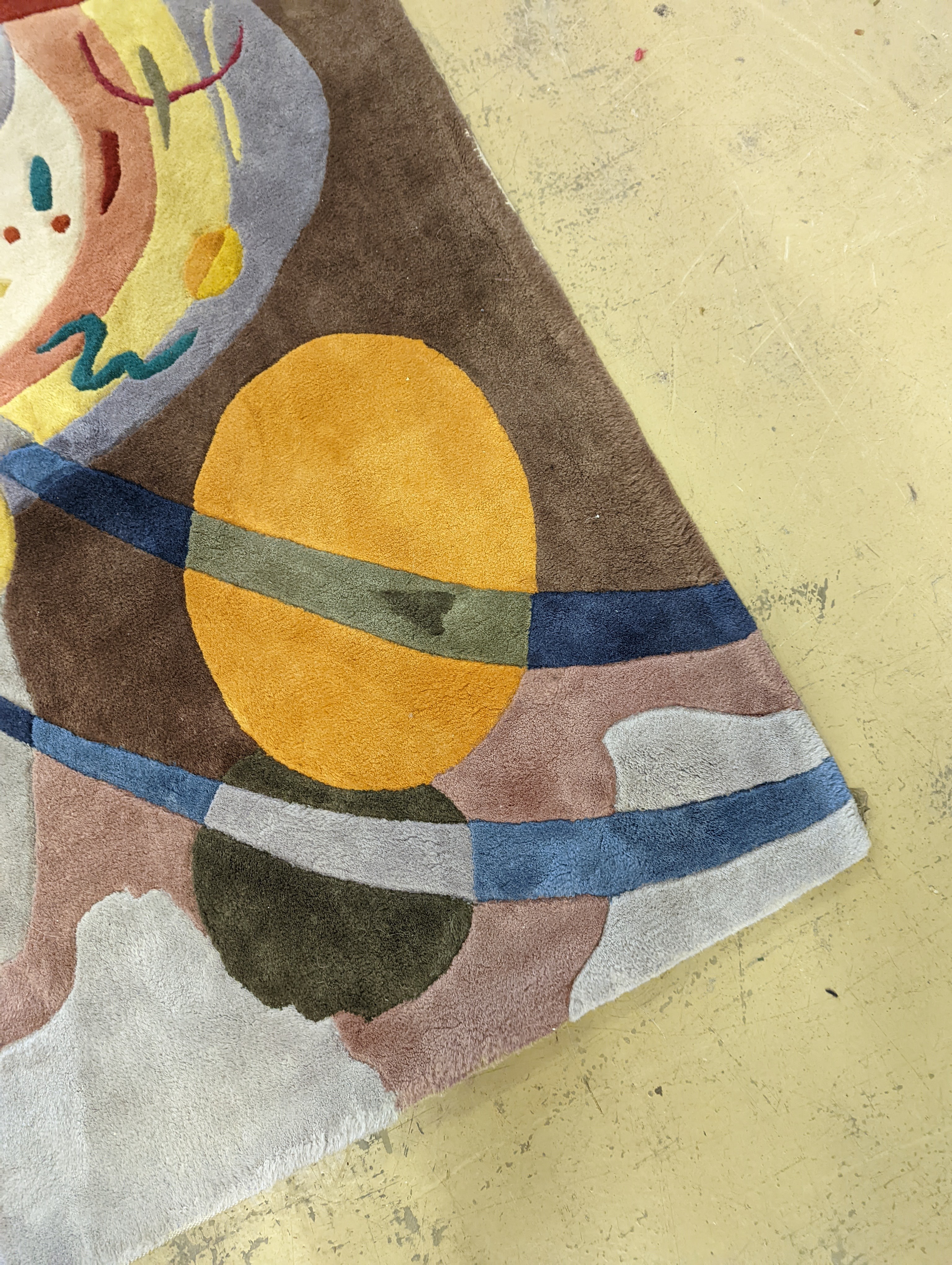 A contemporary Picasso inspired polychrome abstract pattern rug, 246 x 160cm